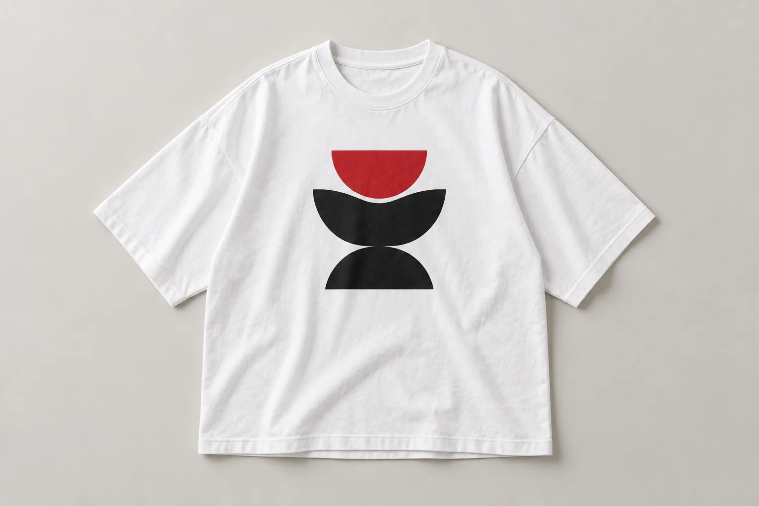 Illustrative mockup of an oversized t-shirt with a red and black geometric print