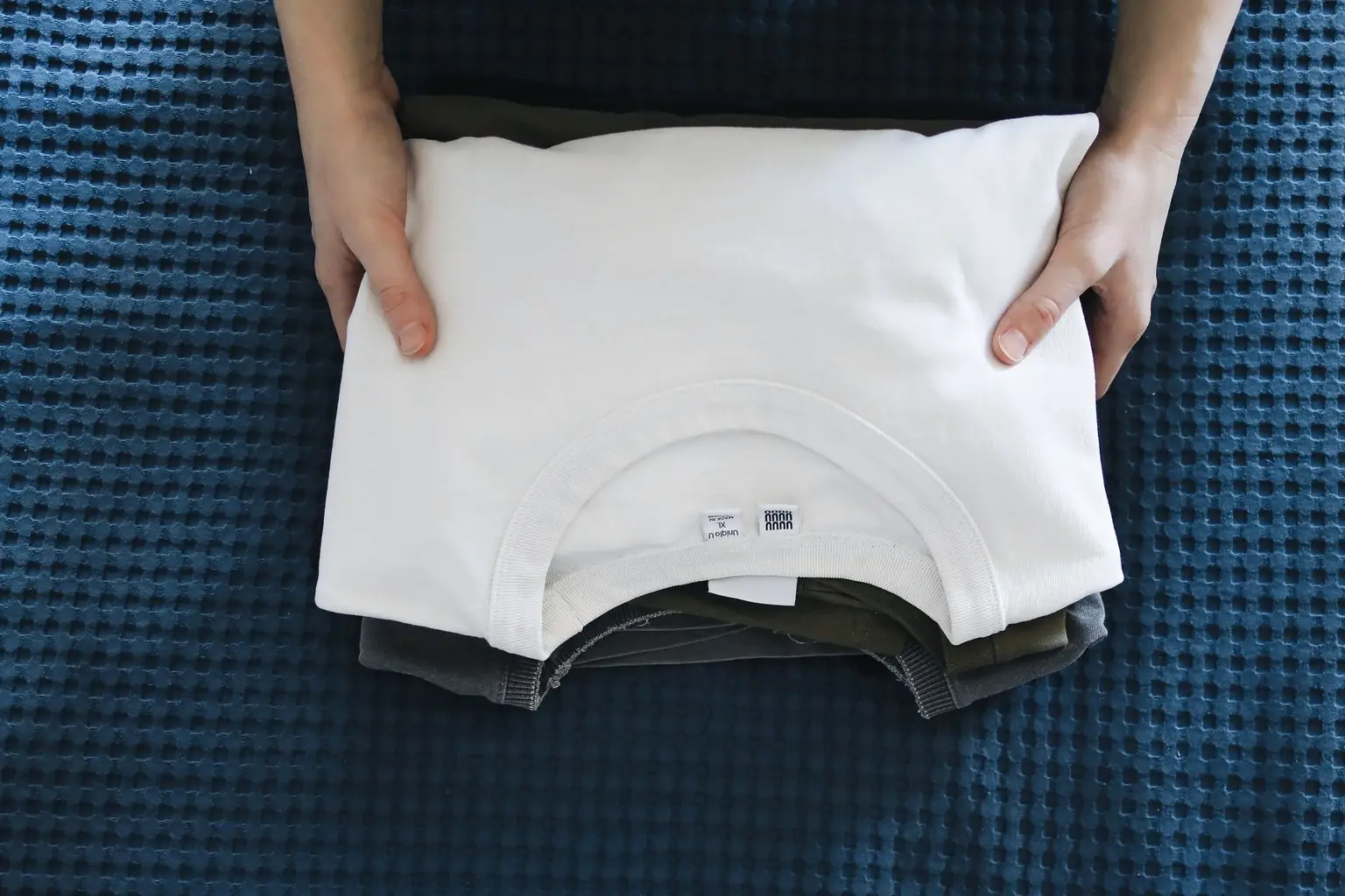 A plain white cotton t-shirt, the blank Lebseh prints on